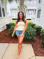 Butter Sleeveless Peplum Top